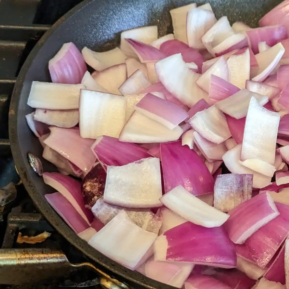 Raw Red Onions in a Skillet